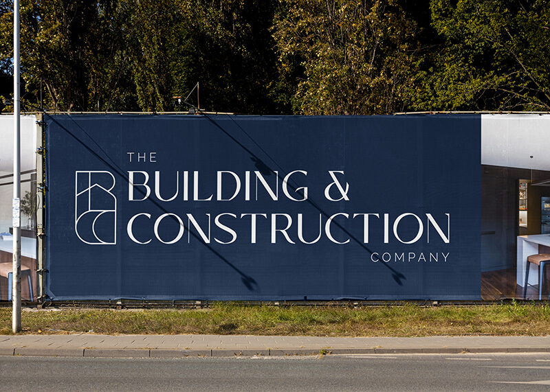 Copanero font in use by The Building & Construction Company from Melbourne, Australia. A blue construction site fence shows the company‘s logo in Copanero.